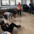 Salariés participant à des séances de circuit training en entreprise à Toulouse pour optimiser le bien-être au travail.